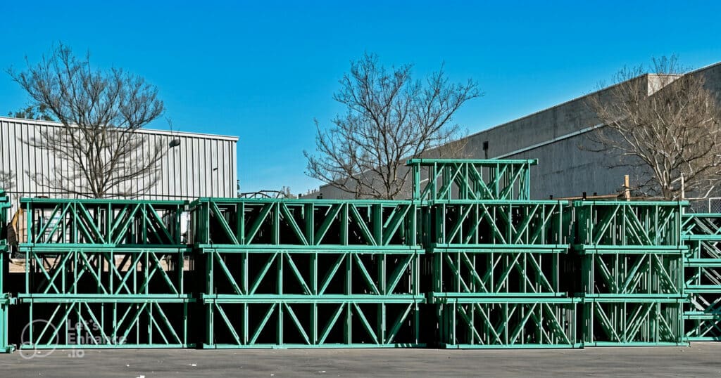 IMH green manufactured Uprights in outside storage.