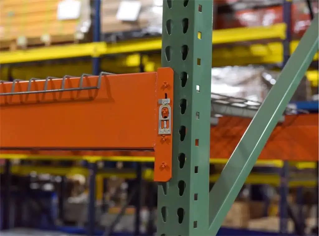 IMH Green and orange racks IMH Manufactured green uprights and orange beams in a warehouse