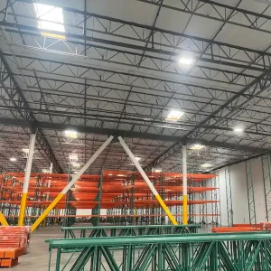 Close-up view of pallet racks being installed at the Primax Wheels warehouse in Ontario, California.
